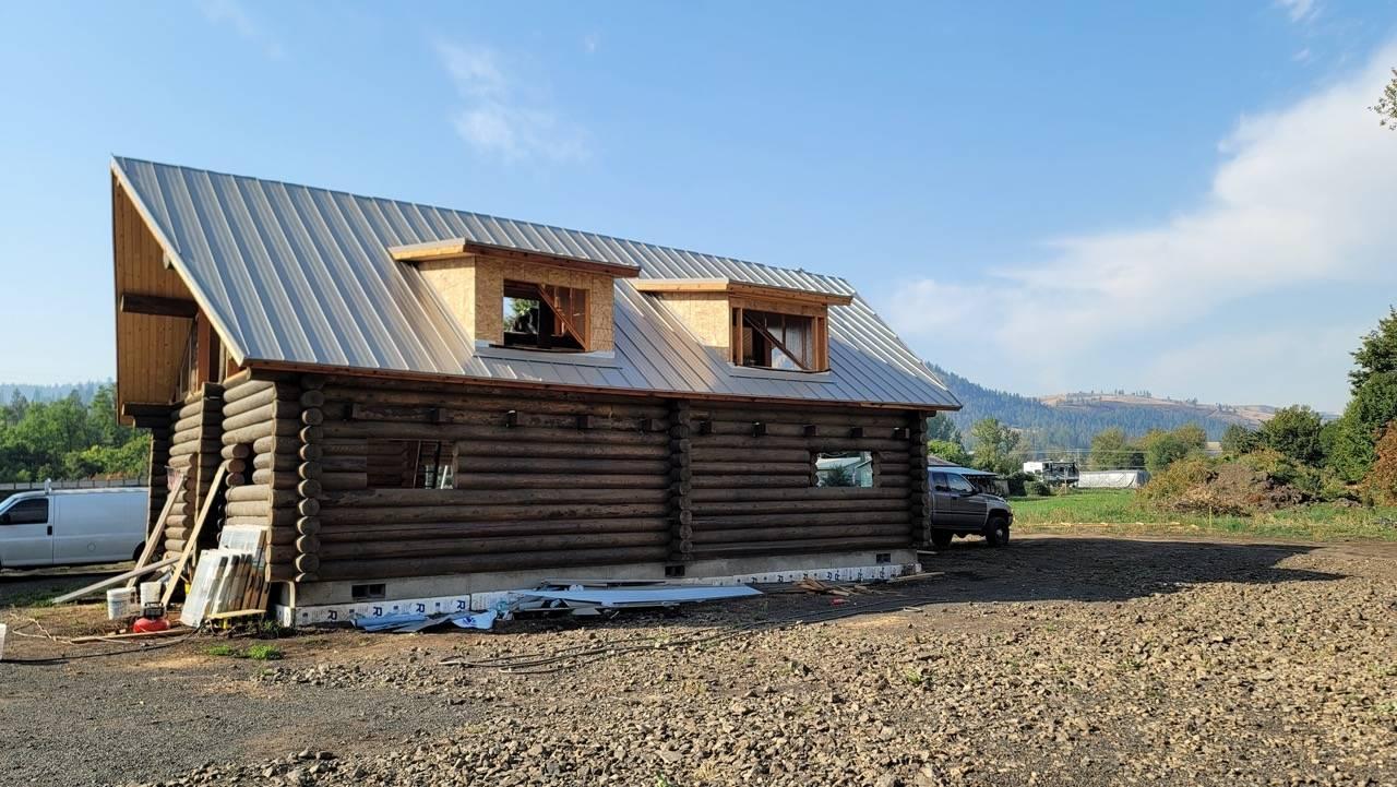 Landscape Photo Metal Roof On Cabin