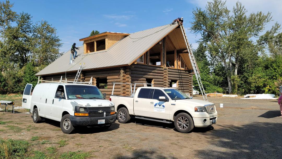 Photo Spanaway Roofing Cabin working