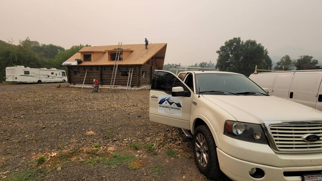 Spanaway Roofing Working on Cabin